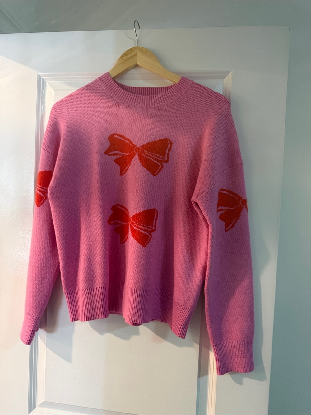 THML Pink Sweater with Red Bow Motifs